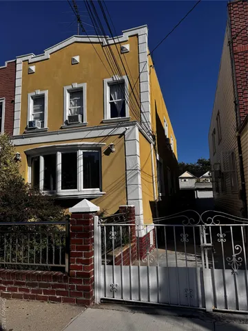 a front view of a house with glass windows