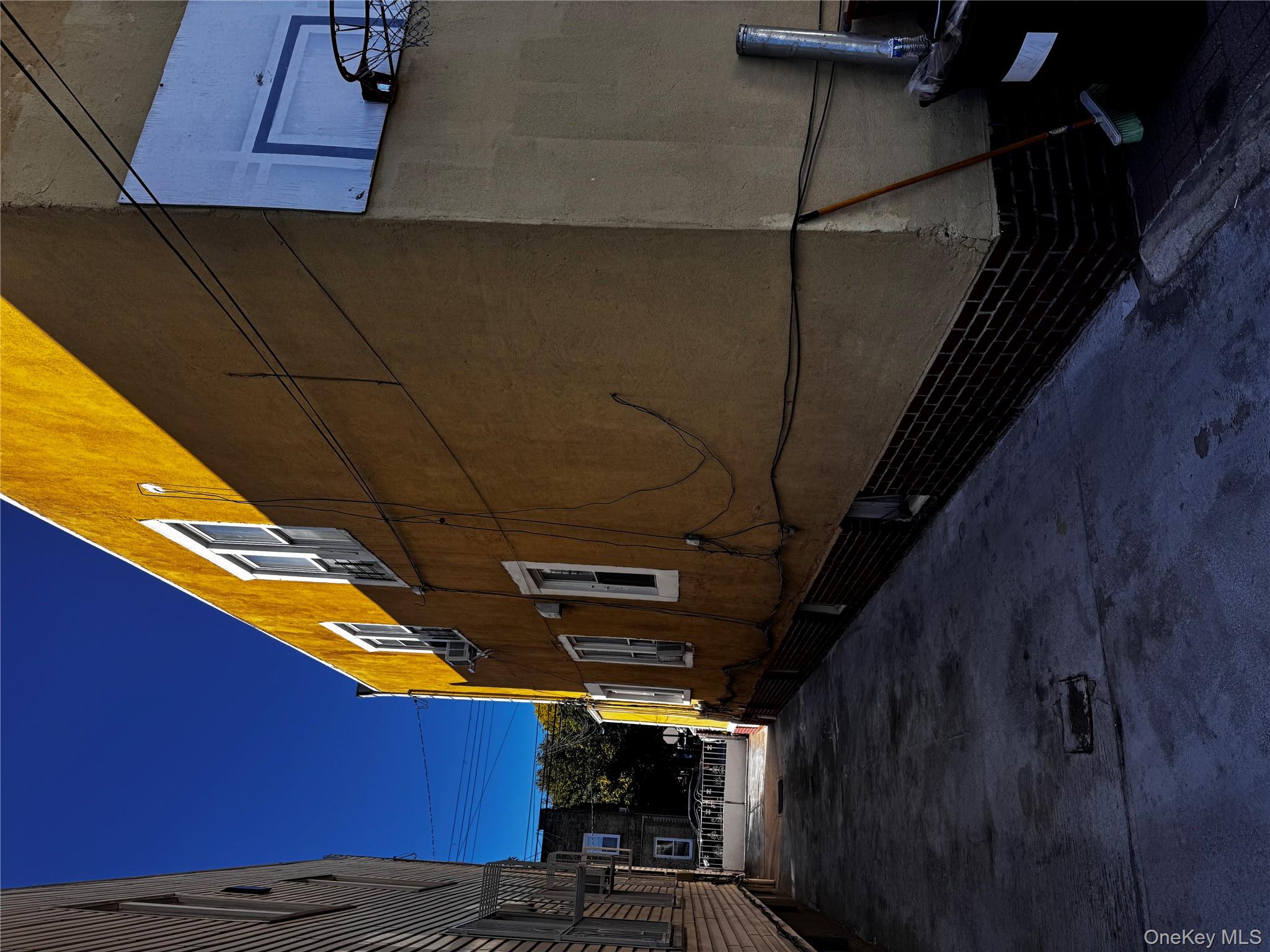 97-40 Corona Avenue Queens, NY 11368 - Photo 3 of 7 a view of a back yard of the house