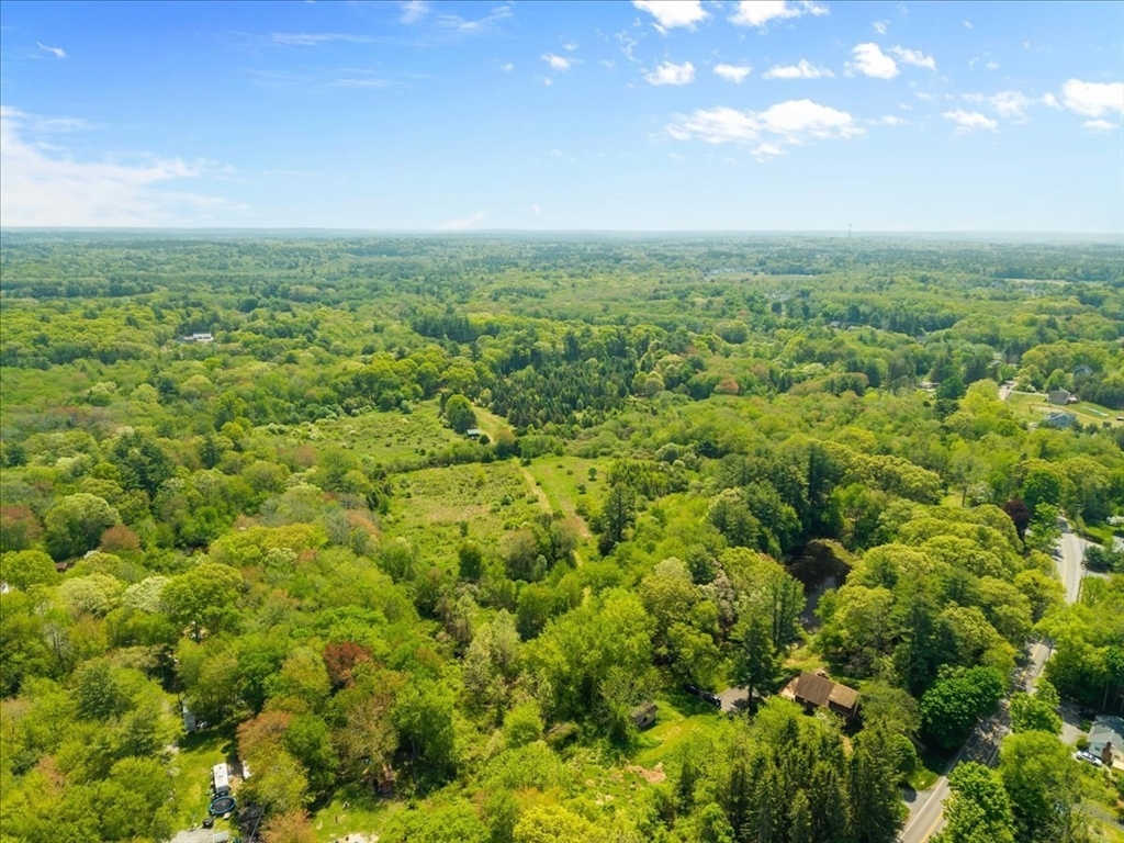548 R Berkley Street Berkley, MA 02779 - Photo 6 of 12 an aerial view of residential houses with outdoor space and trees