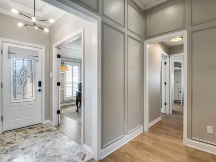 a view of a bathroom with a shower and a sink