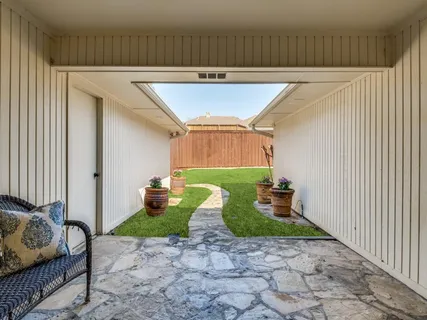 a view of swimming pool with outdoor seating