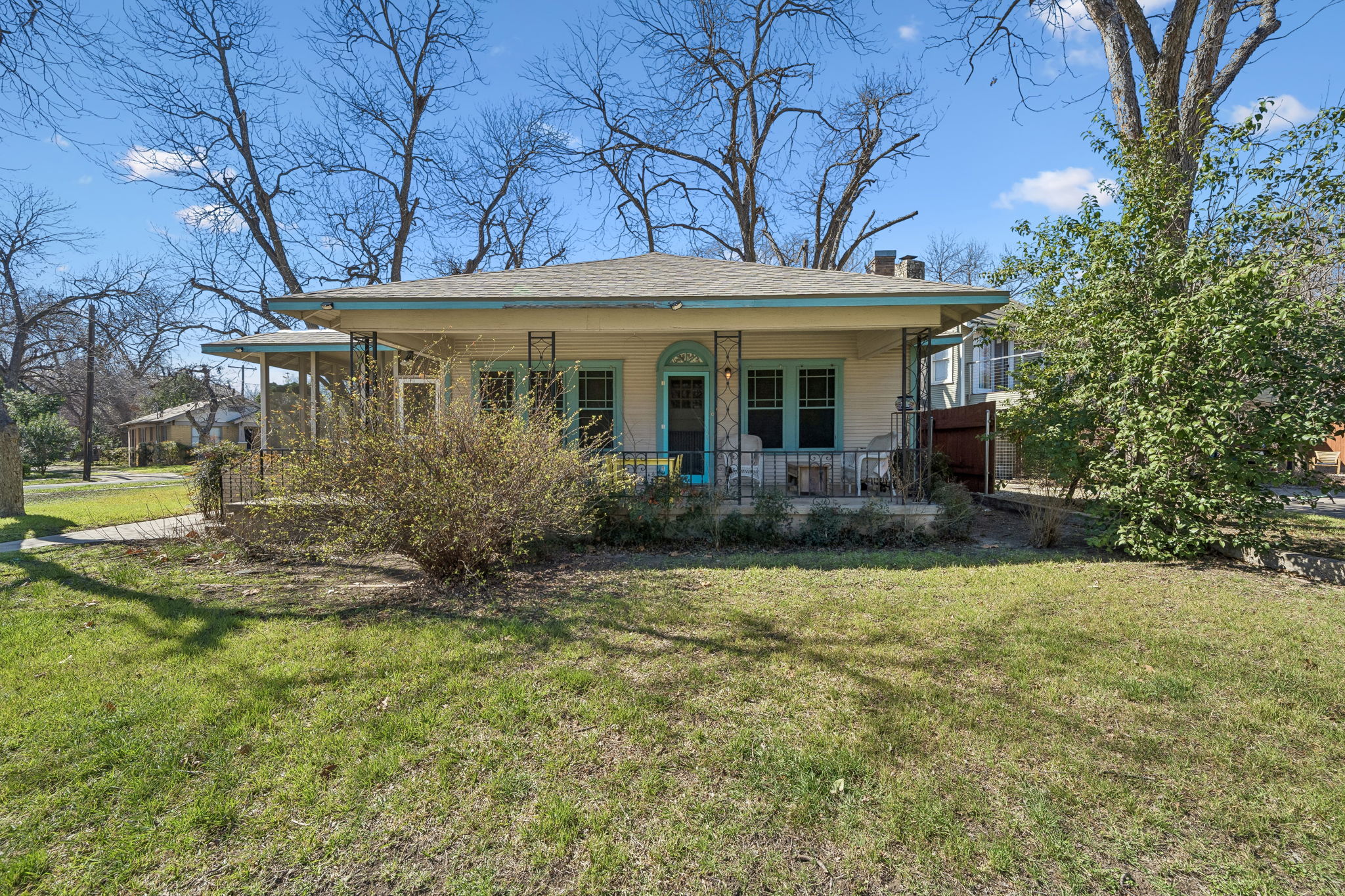 a front view of a house with garden