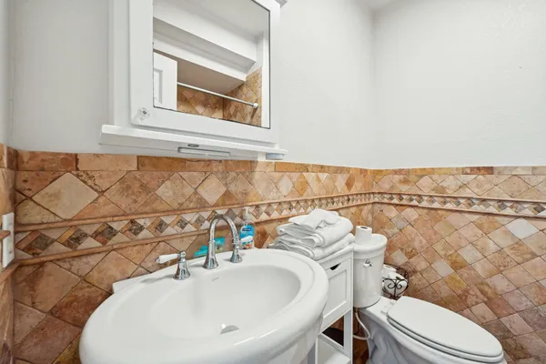 a bathroom with a sink and a toilet