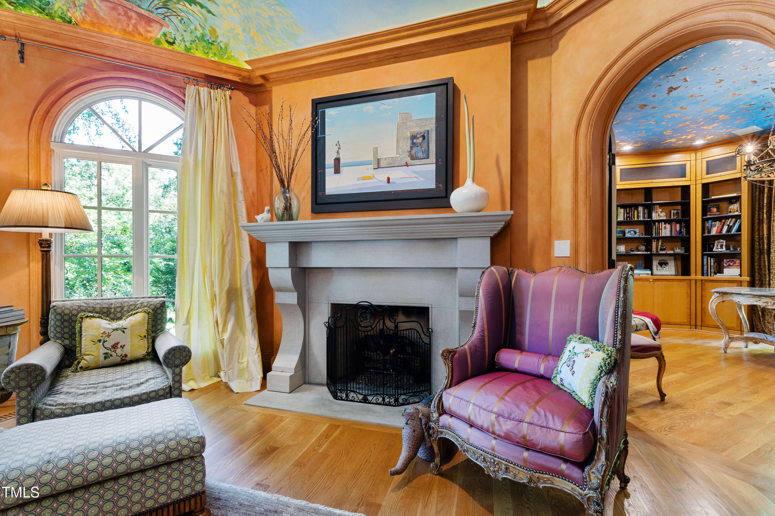 2658 Davis Street Raleigh, NC 27608 - Photo 19 of 99 a living room with furniture a fireplace and a large window