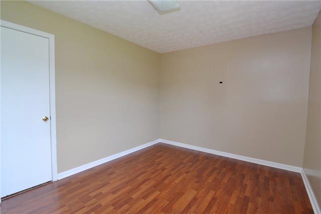 128 Brookside Point Springfield, TN 37172 - Photo 9 of 12 a view of room with wooden floor