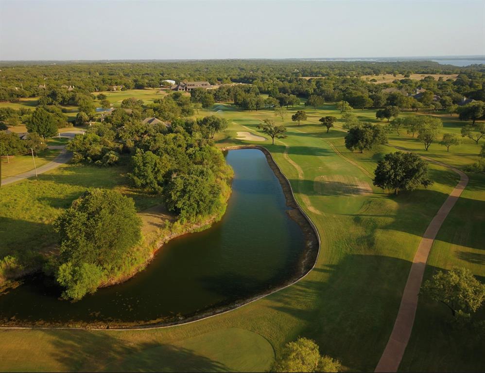 1377 Spring Valley Trail Whitney, TX 76692 - Photo 19 of 34 an aerial view of residential houses with outdoor space