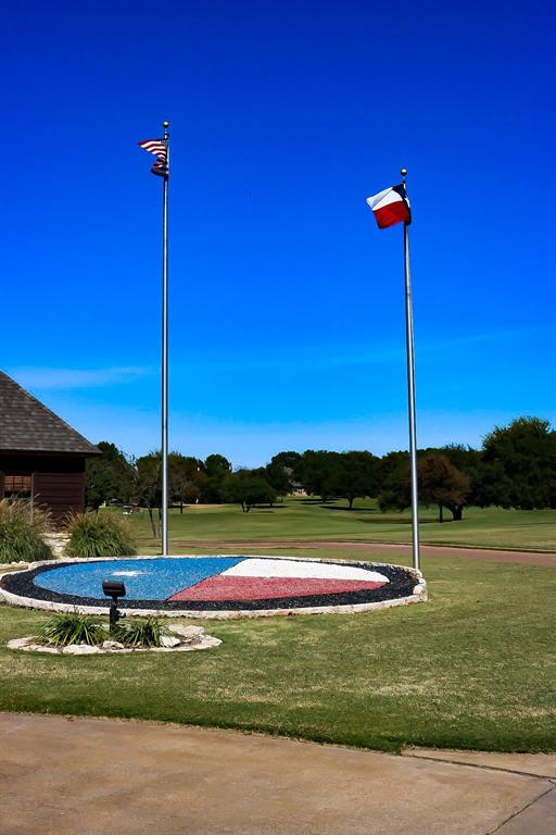 1377 Spring Valley Trail Whitney, TX 76692 - Photo 31 of 34 a view of a house with a big yard