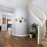 a view of entryway with livingroom and wooden floor