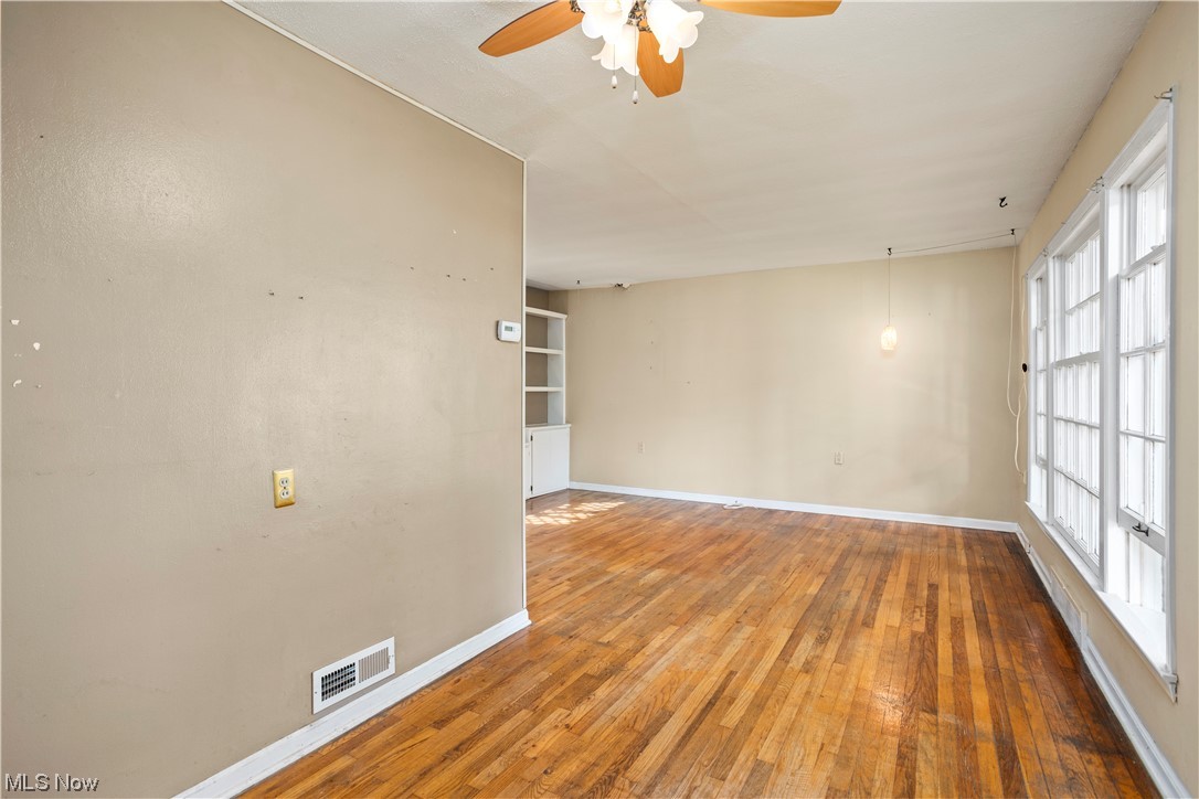 38650 Johnnycake Ridge Road Willoughby, OH 44094 - Photo 6 of 34 Living room open to dining