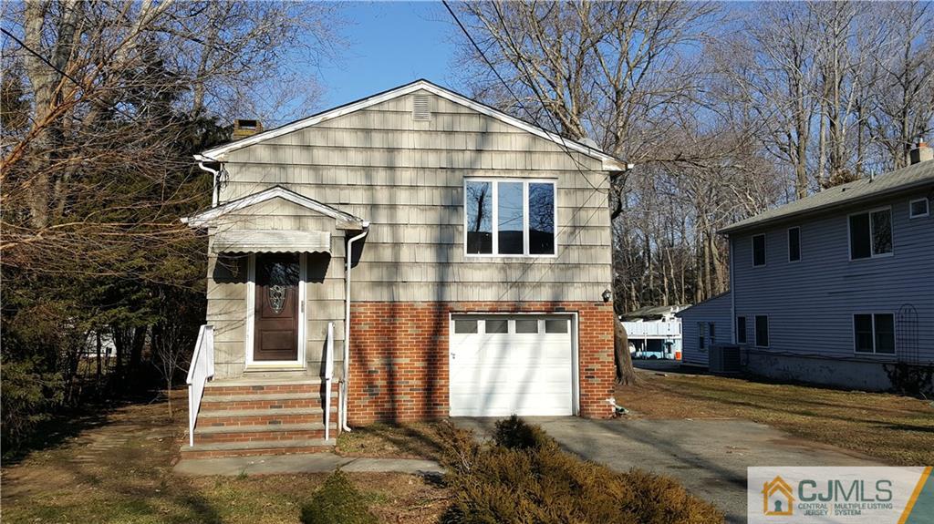 767 Magnolia Road North Brunswick, NJ 08902 - Photo 1 of 15 a front view of a house