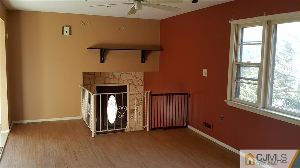 767 Magnolia Road North Brunswick, NJ 08902 - Photo 2 of 15 an entryway with a window and wooden floor