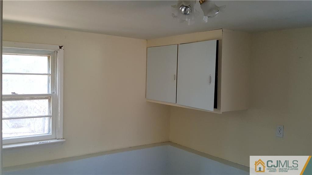 767 Magnolia Road North Brunswick, NJ 08902 - Photo 13 of 15 an empty room with a window