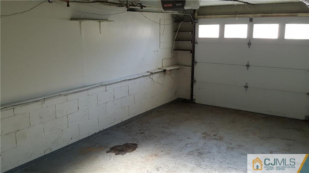767 Magnolia Road North Brunswick, NJ 08902 - Photo 14 of 15 a view of a room with racks on the wall