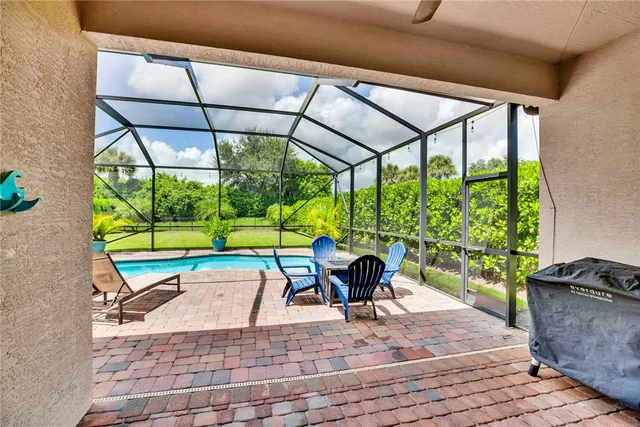 a chair and table in the patio