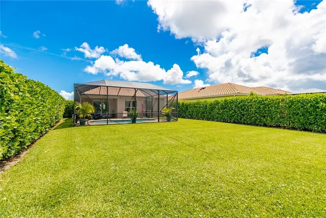a view of a swimming pool is middle in the middle of the building