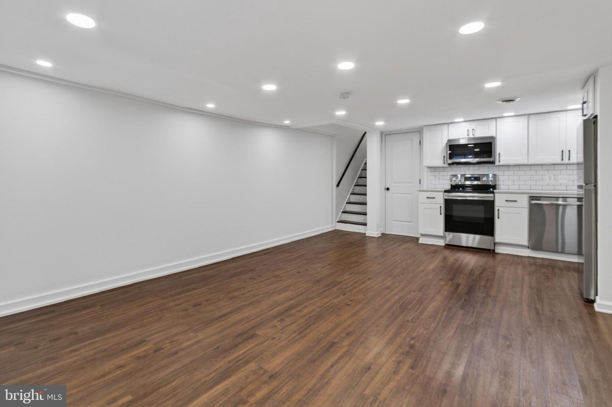 738 11th Street Northeast, Unit 3 Washington, DC 20002 - Photo 11 of 29 Spacious, modern kitchen and living area.