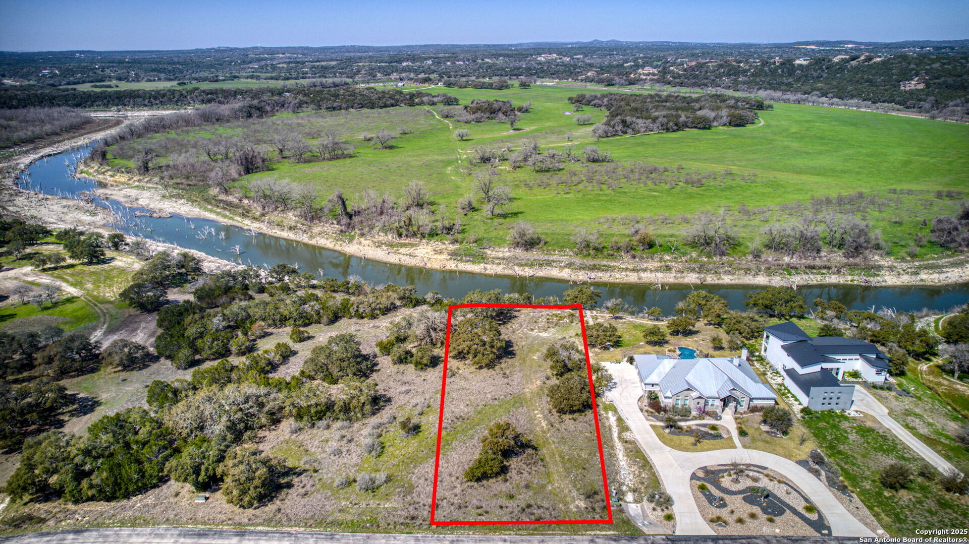 365 River Cliff Place Spring Branch, TX 78070 - Photo 3 of 48 a view of a city and lake