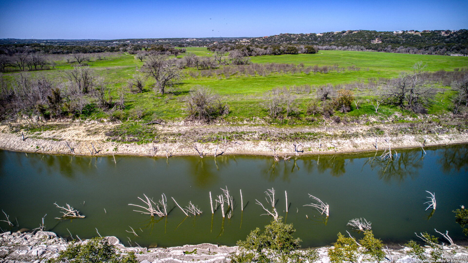 365 River Cliff Place Spring Branch, TX 78070 - Photo 45 of 48 a view of a lake with a mountain