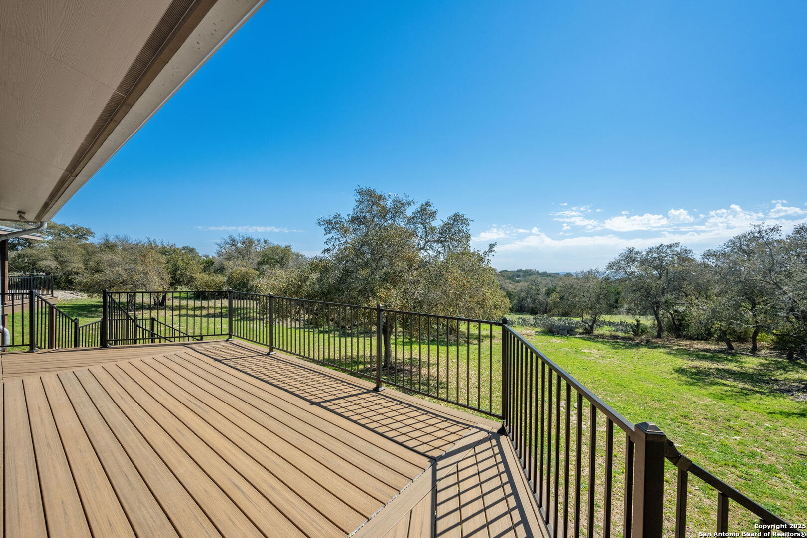 365 River Cliff Place Spring Branch, TX 78070 - Photo 10 of 48 a view of a balcony with yard