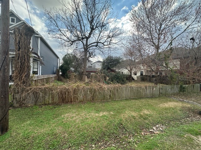 1418 West 24th Street Houston, TX 77008 - Photo 1 of 9 a view of a backyard with a large tree