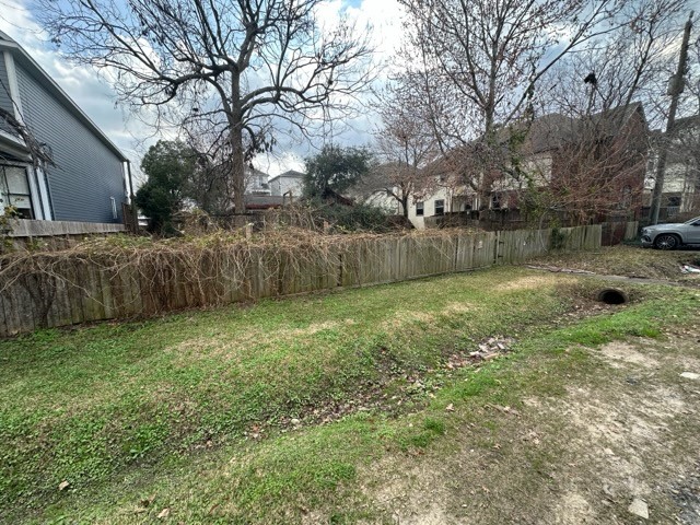 1418 West 24th Street Houston, TX 77008 - Photo 5 of 9 a backyard of a house with lots of green space