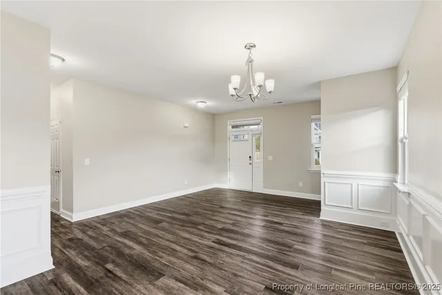 a view of a livingroom with wooden floor