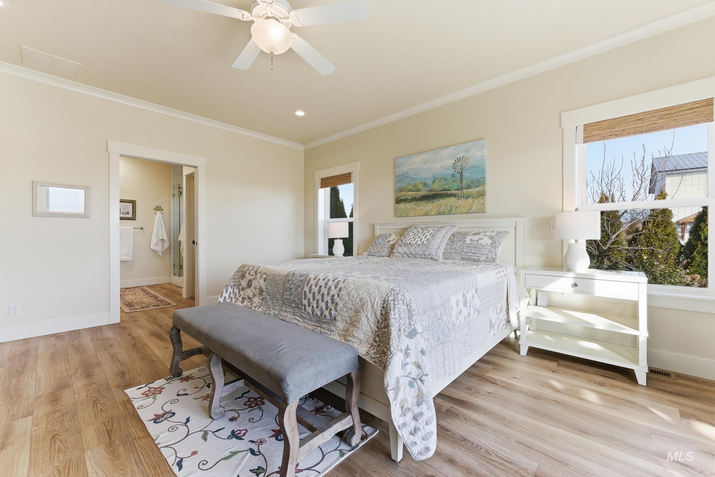 5800 Partridge Peak Avenue Caldwell, ID 83607 - Photo 18 of 50 Bedroom featuring ornamental molding, light wood-style flooring, ensuite bath, a ceiling fan, and recessed lighting