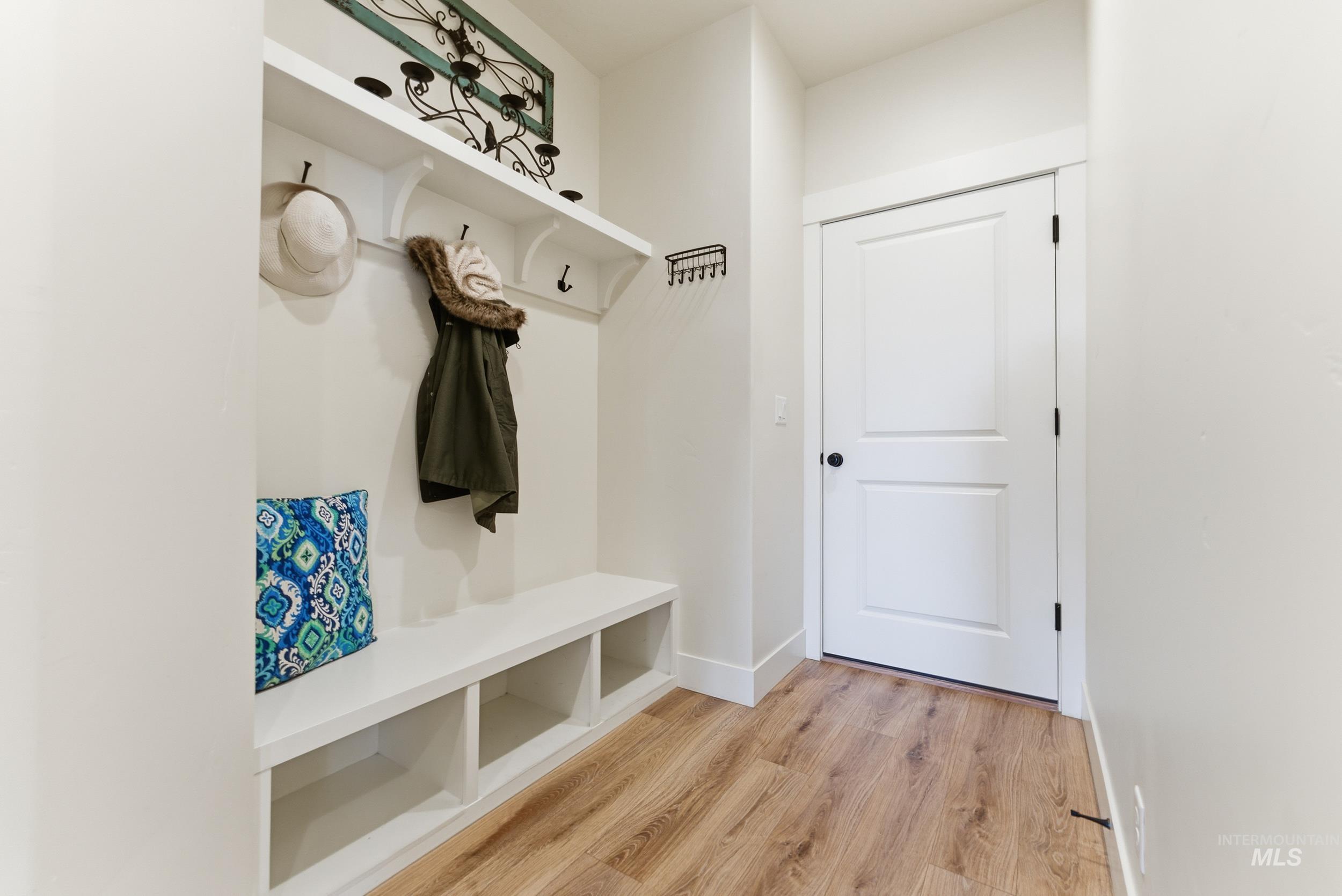 5800 Partridge Peak Avenue Caldwell, ID 83607 - Photo 35 of 50 Mudroom with light wood finished floors and baseboards