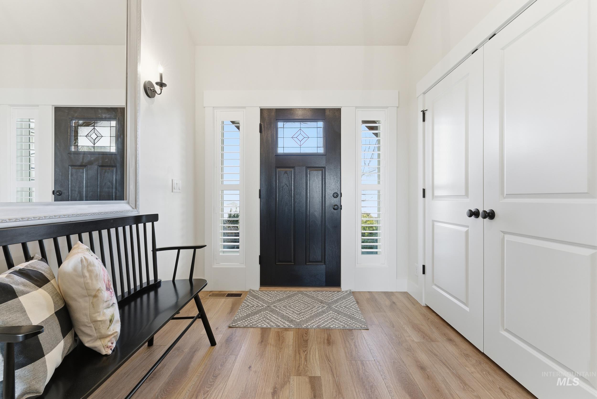 5800 Partridge Peak Avenue Caldwell, ID 83607 - Photo 4 of 50 Foyer with light wood-style floors and healthy amount of natural light