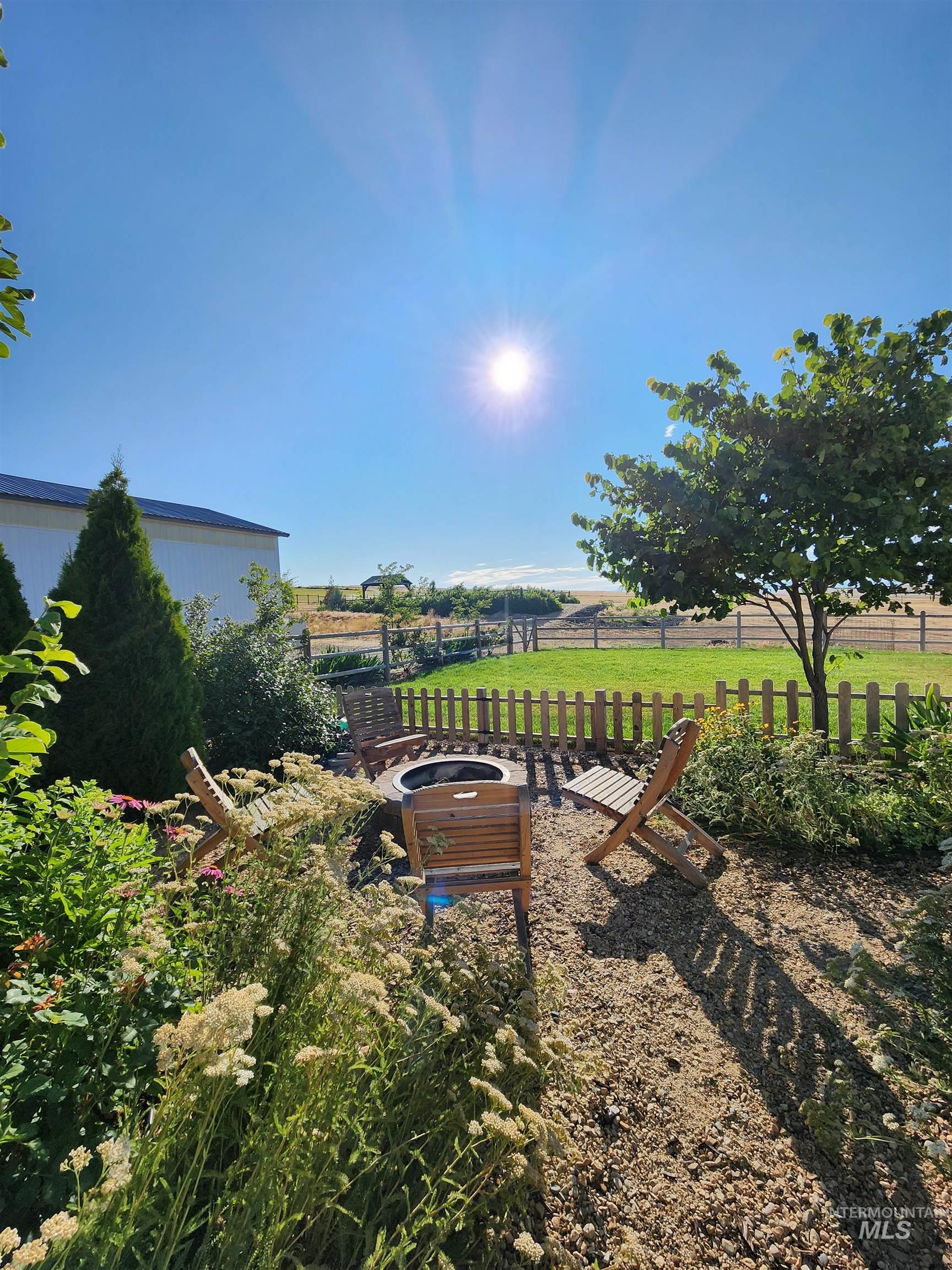5800 Partridge Peak Avenue Caldwell, ID 83607 - Photo 43 of 50 View of yard with an outdoor fire pit