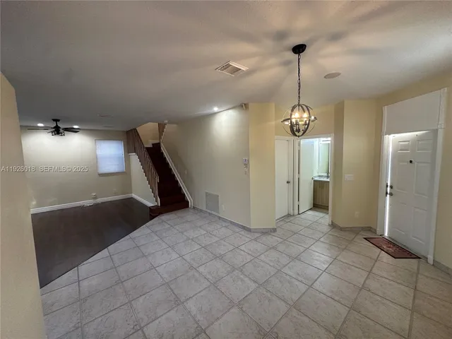 a view of a hallway with entryway