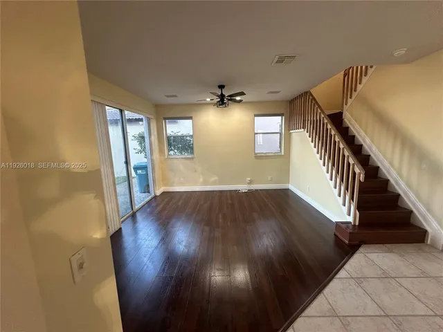 a view of entryway with wooden floor