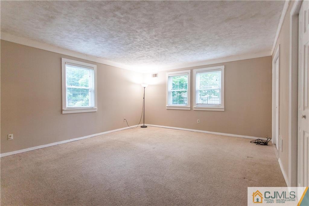29 Maida Road Edison, NJ 08820 - Photo 12 of 17 an empty room with windows
