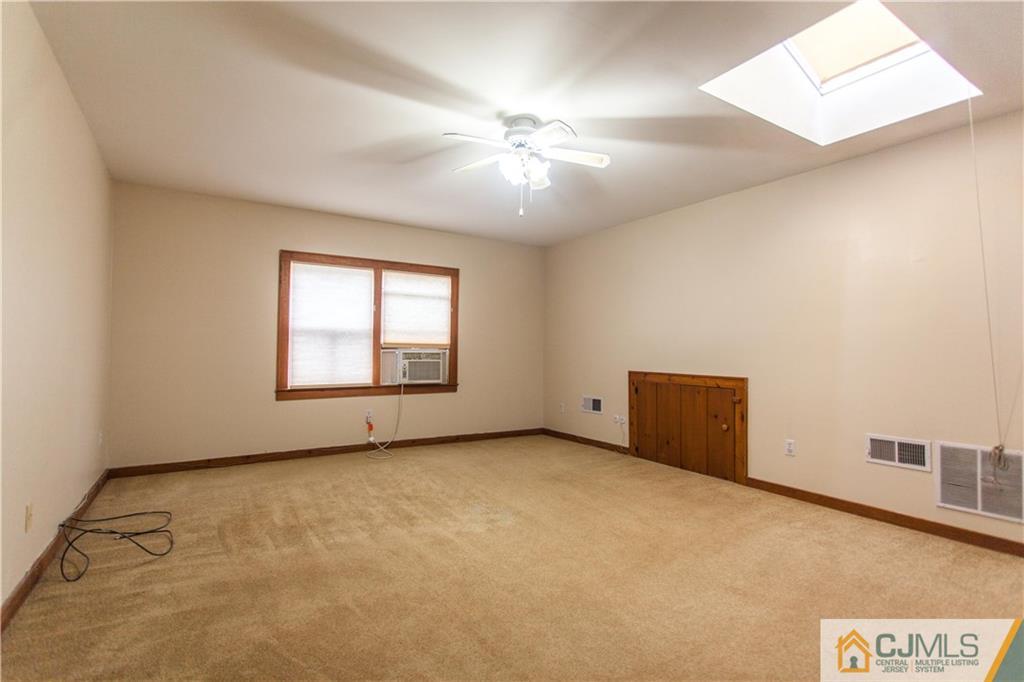 29 Maida Road Edison, NJ 08820 - Photo 13 of 17 a view of an empty room with a window