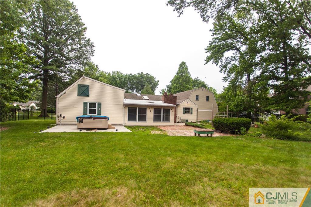 29 Maida Road Edison, NJ 08820 - Photo 15 of 17 a view of a house with a backyard