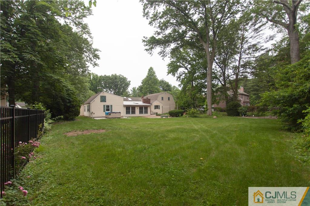 29 Maida Road Edison, NJ 08820 - Photo 16 of 17 a view of a house with backyard and garden