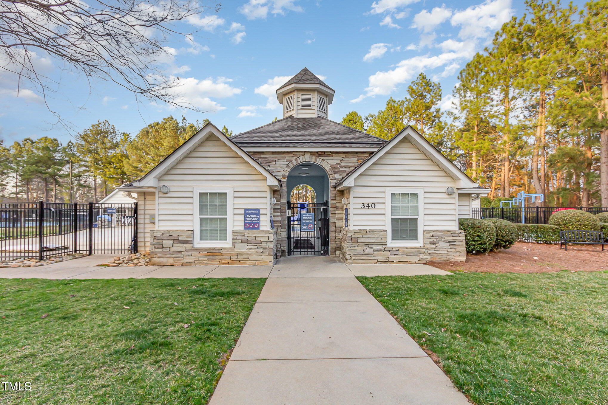 405 Challenge Road Raleigh, NC 27603 - Photo 18 of 24 a view of a house with a yard and sitting area