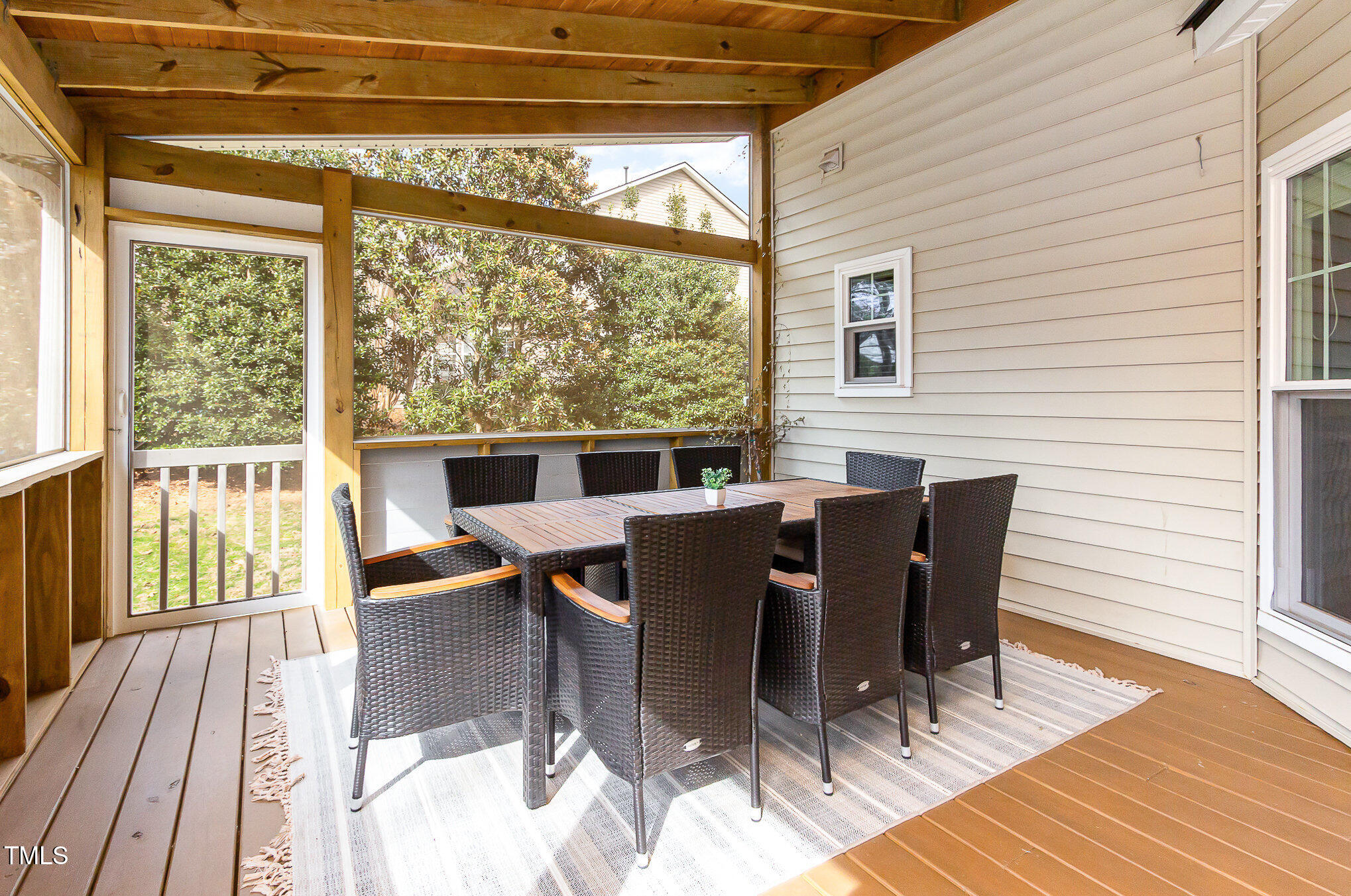 405 Challenge Road Raleigh, NC 27603 - Photo 8 of 24 a view of a dining room with furniture and wooden floor