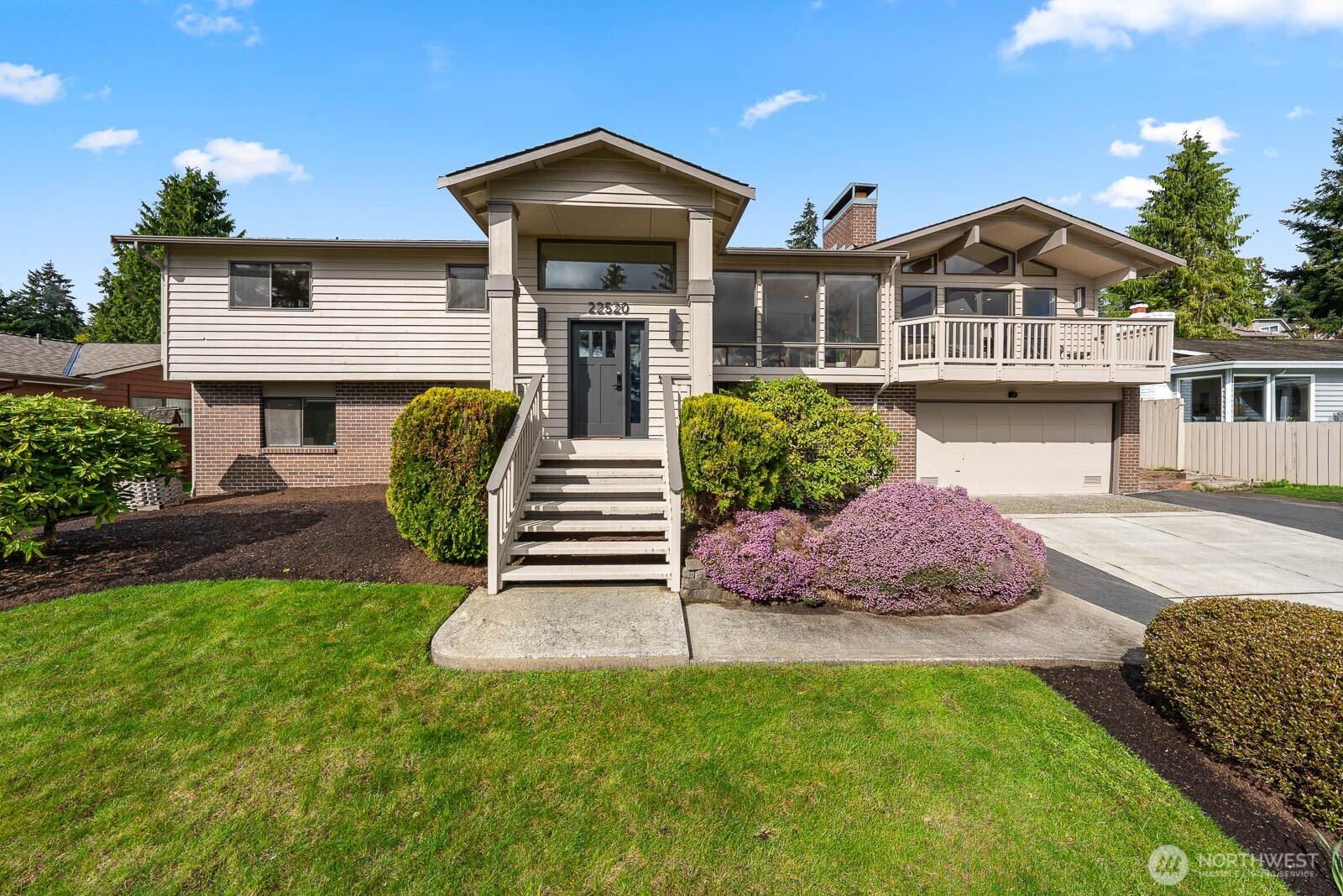 22520 4th Avenue Southeast Bothell, WA 98021 - Photo 1 of 35 a front view of a house with a yard and porch