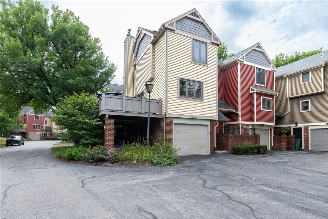 70 Cornhill Place Rochester, NY 14608 - Photo 2 of 23 Side Deck/ Attached garage