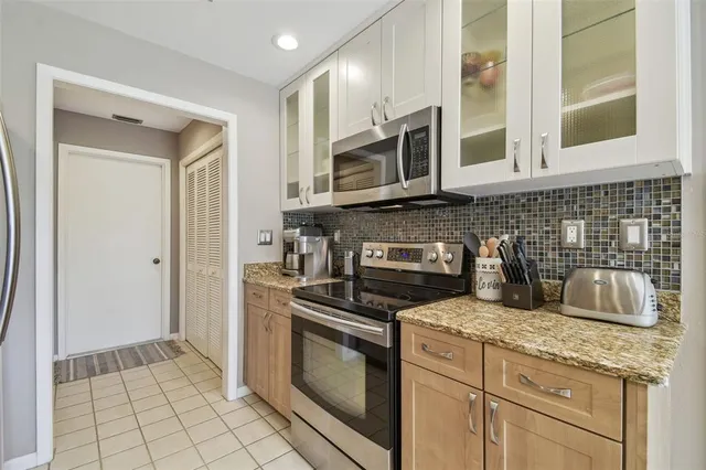 a kitchen with a sink and a window