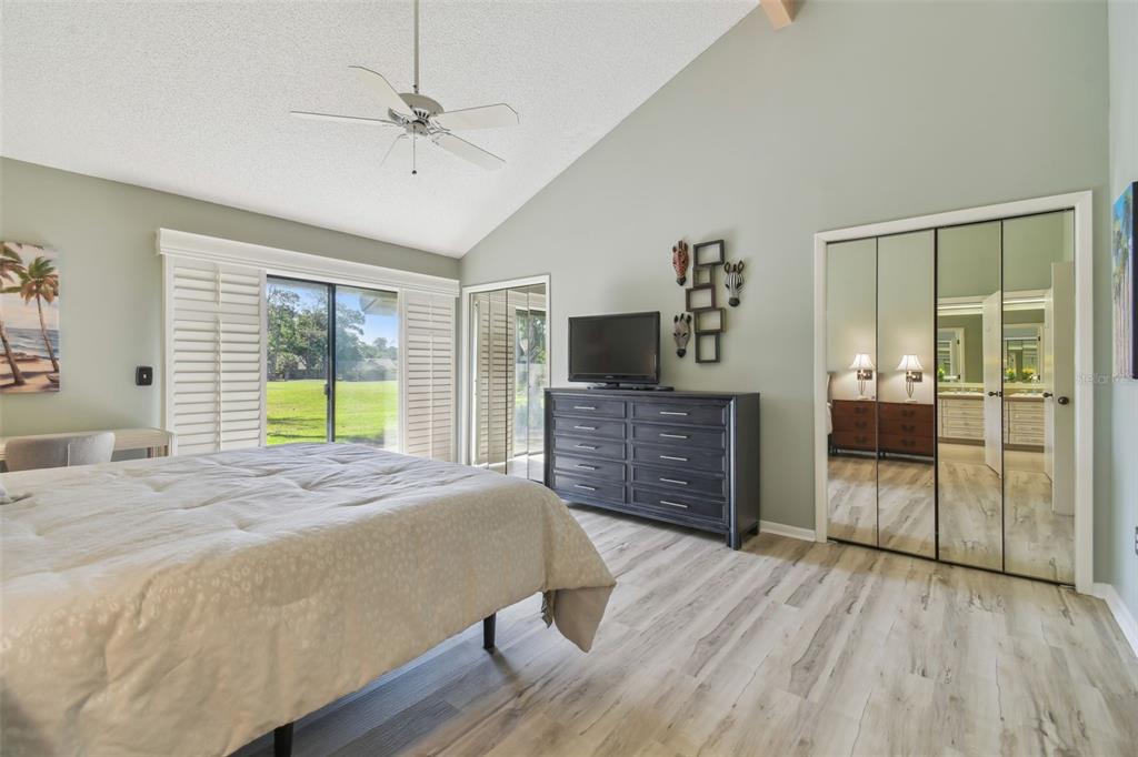 5434 Kemkerry Road Wesley Chapel, FL 33543 - Photo 22 of 56 a spacious bedroom with a bed and a dresser