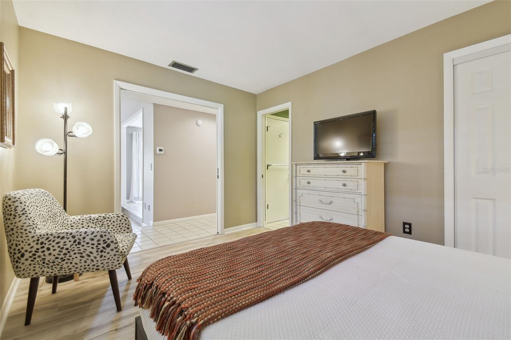 5434 Kemkerry Road Wesley Chapel, FL 33543 - Photo 31 of 56 a bedroom with a bed and a flat screen tv