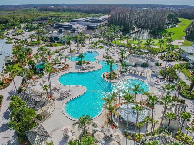 a view of multiple house with a street