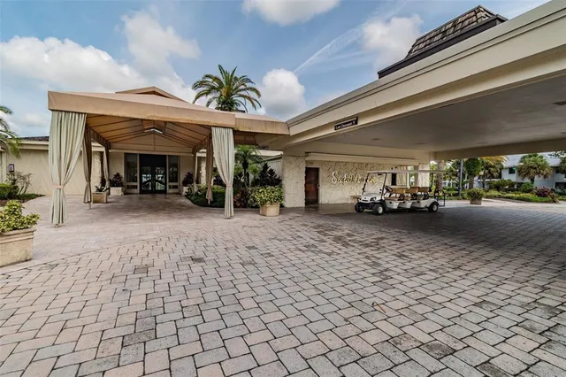 a view of a dining area with furniture window and wooden floor