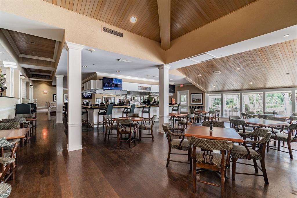 5434 Kemkerry Road Wesley Chapel, FL 33543 - Photo 54 of 56 a view of a dining area with furniture window and wooden floor