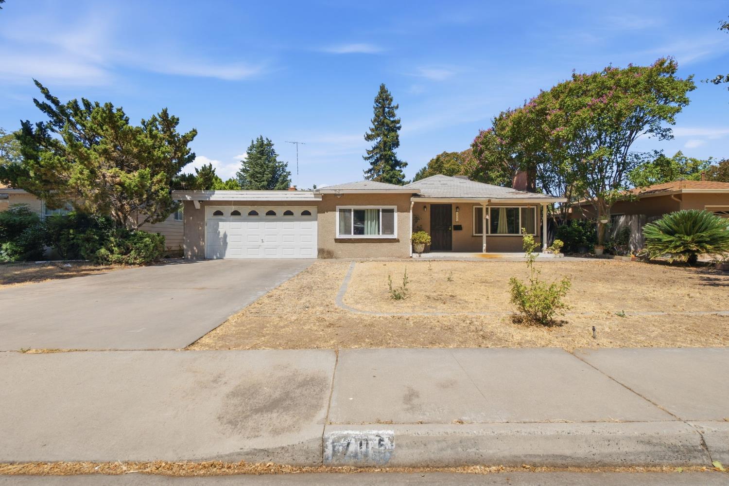 1705 Stetson Avenue Modesto, CA 95350 - Photo 1 of 32 a view of a house with a yard