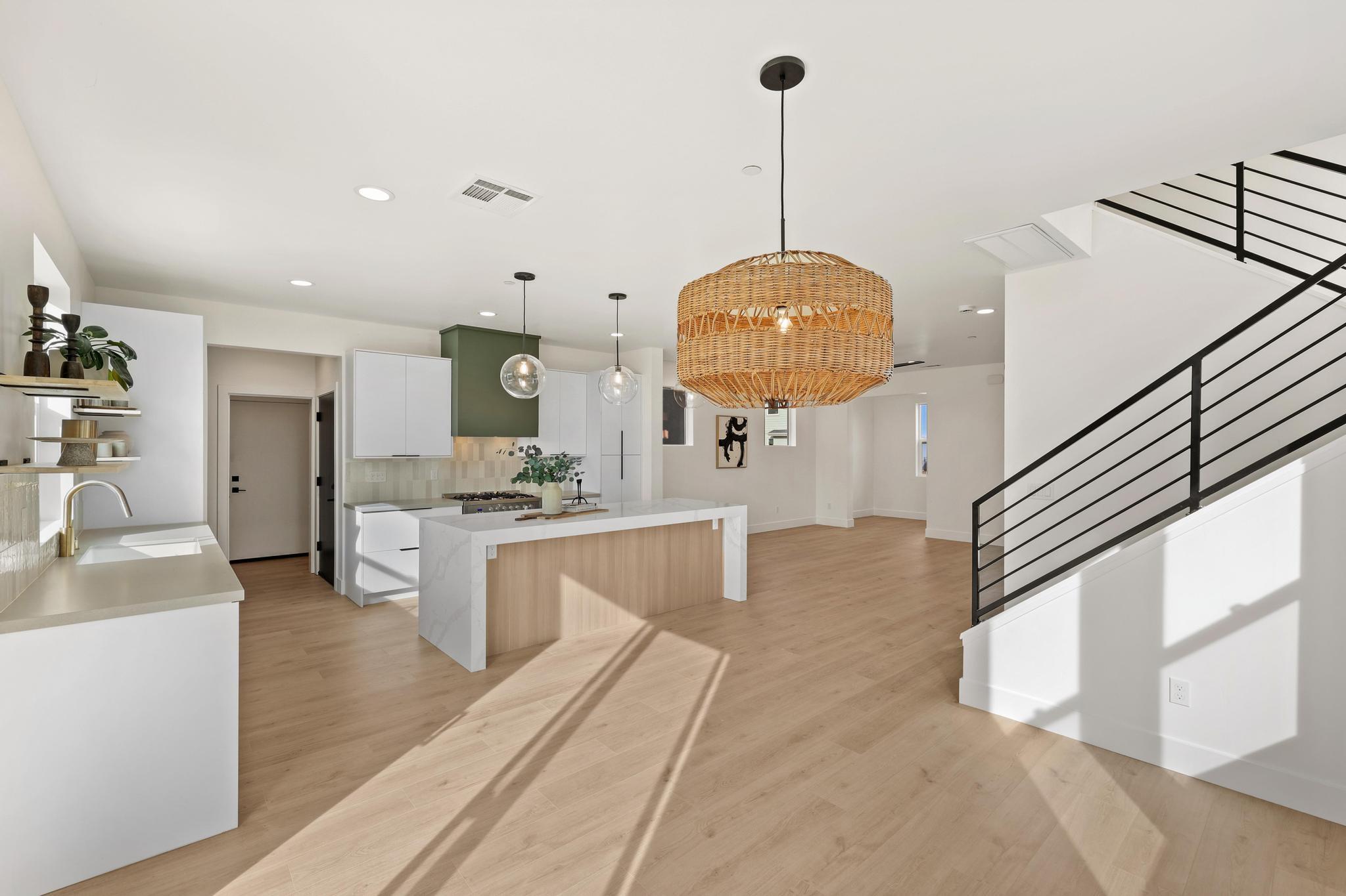 2450 Neighborly Way Redding, CA 96001 - Photo 12 of 48 a view of living room with kitchen island furniture and wooden floor