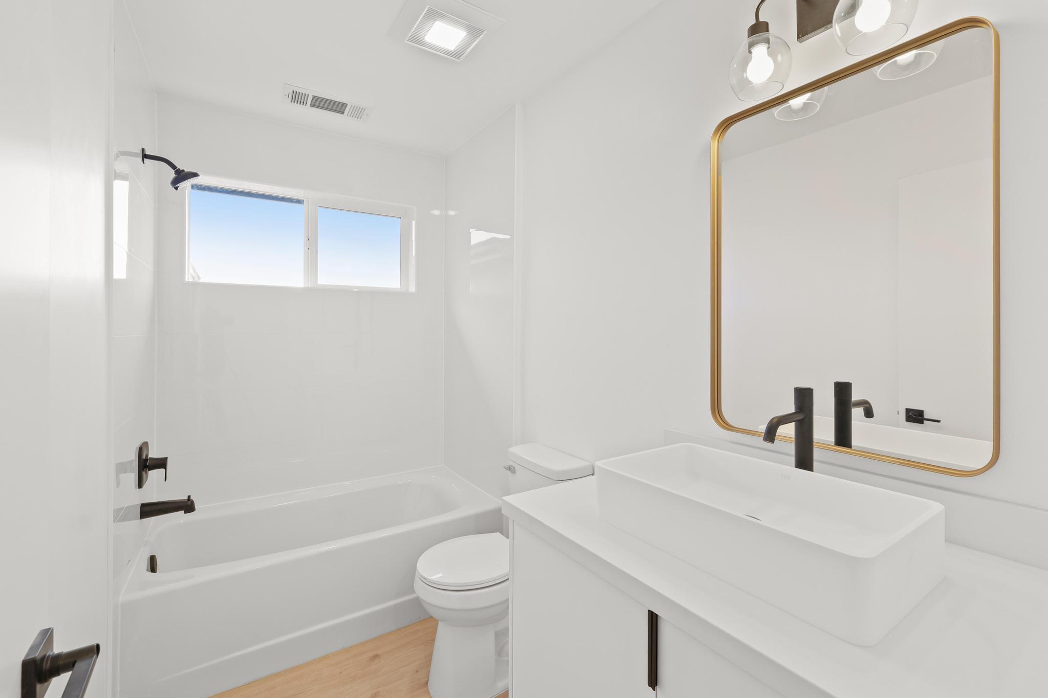 2450 Neighborly Way Redding, CA 96001 - Photo 28 of 48 a bathroom with a sink a toilet and shower