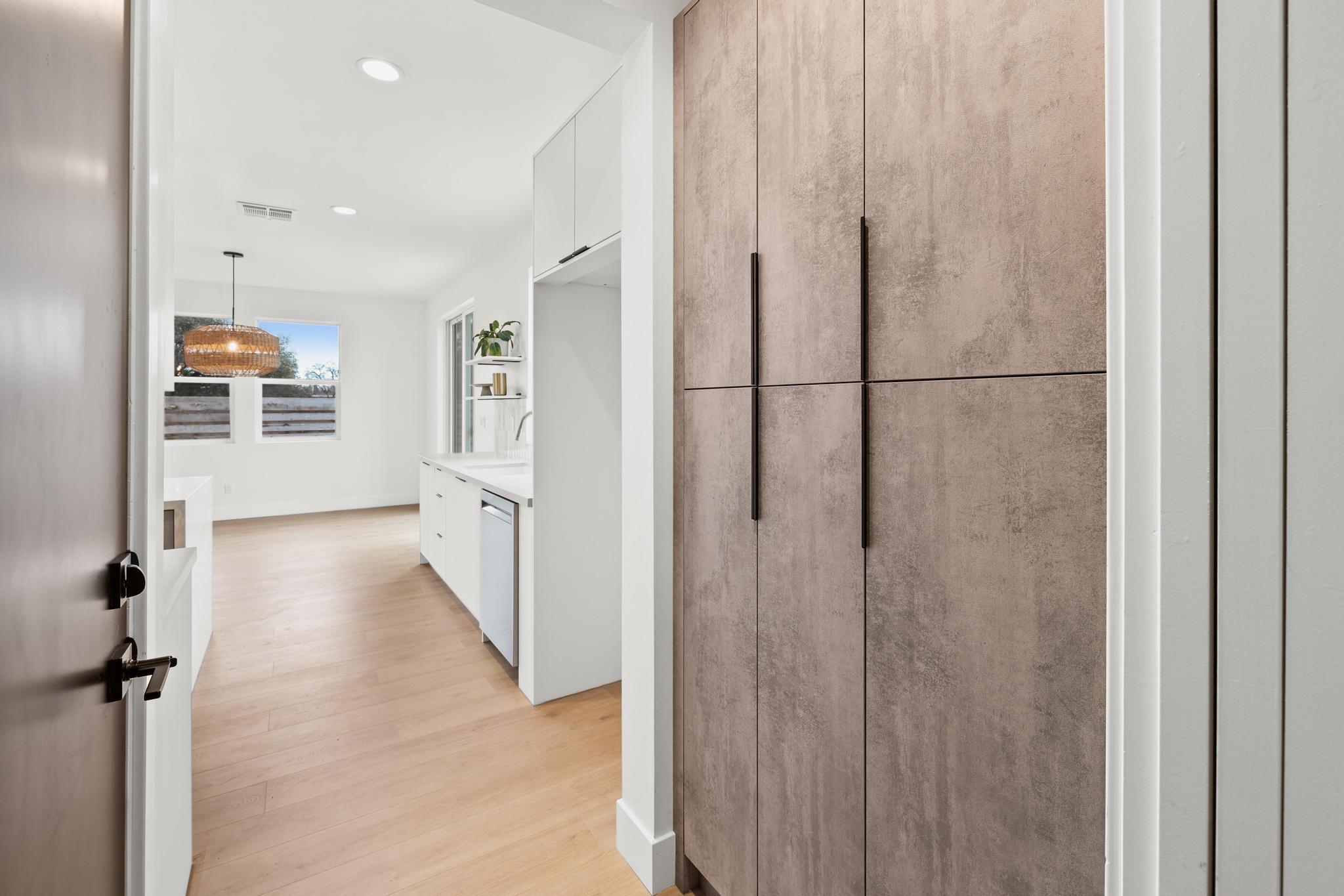 2450 Neighborly Way Redding, CA 96001 - Photo 29 of 48 a view of a hallway with a refrigerator